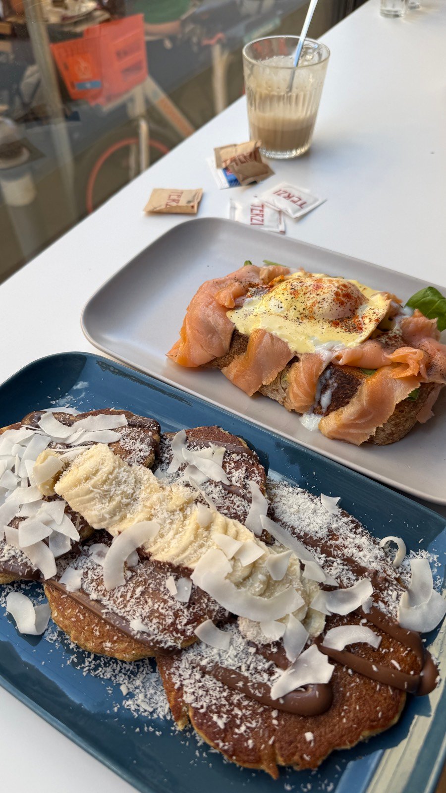 Coconut pancakes and eggs benedict with salmon at Lampadina in Bologna