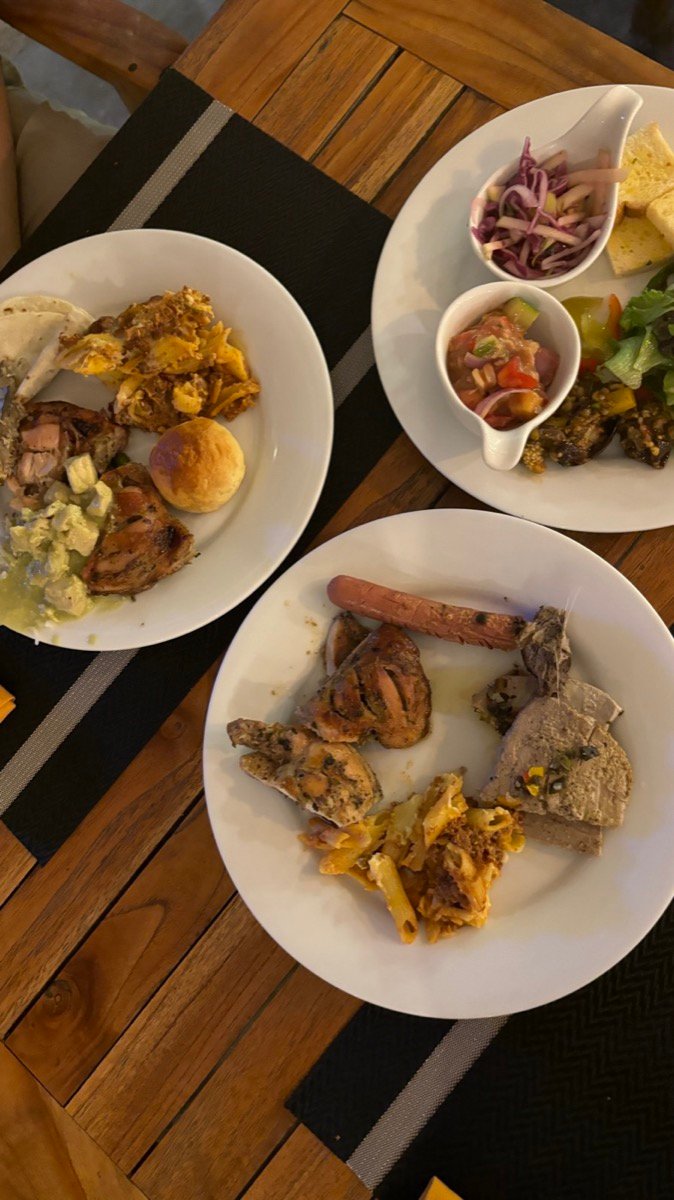 Two plates from the dinner buffet at Arena Beach Restaurant on Maafushi