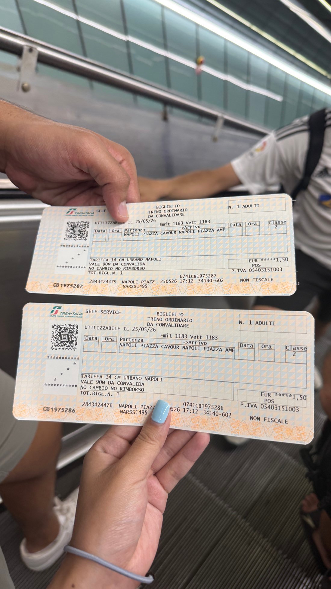 Physical paper train tickets bought from a machine in Naples